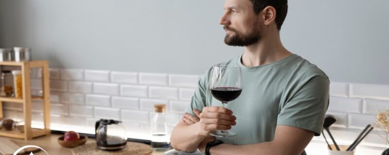 A man holding a wine glass