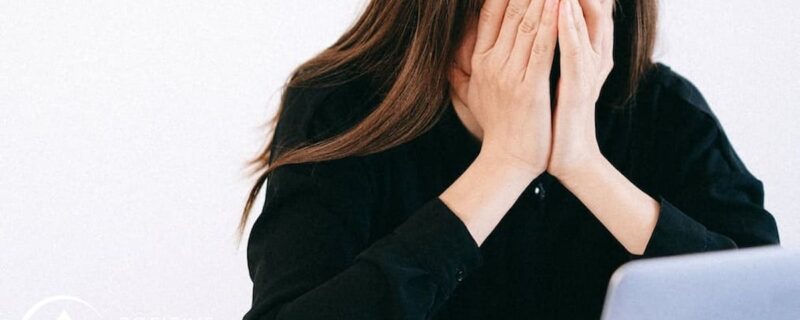 How Substance Use Disorders Destroy Professional Careers 1 Stressed Woman Covering her Face with her Hands